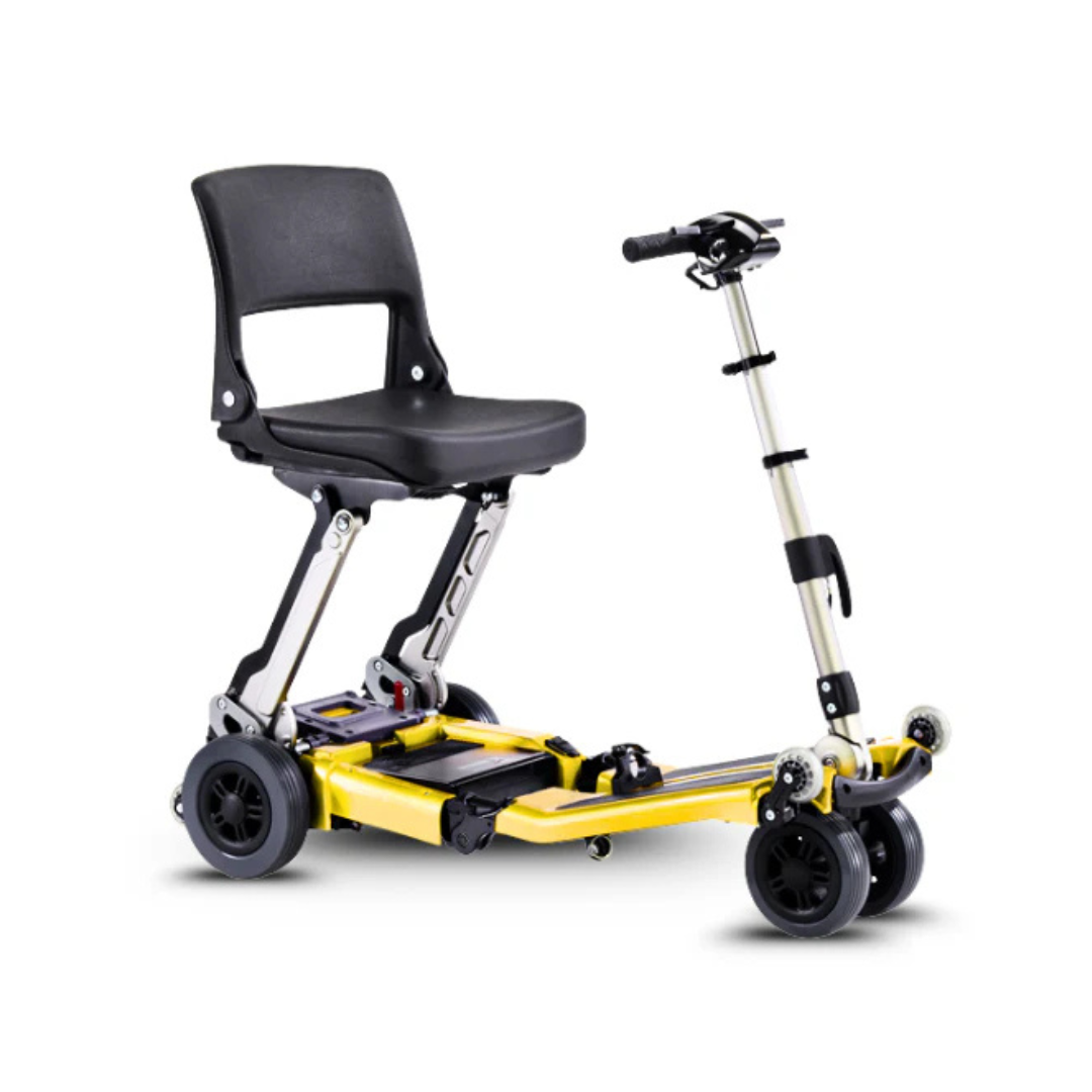 The FreeRider Luggie Standard Travel Scooter is a compact, foldable mobility scooter with a black seat, yellow base, and four wheels, designed for easy transport and personal mobility assistance.